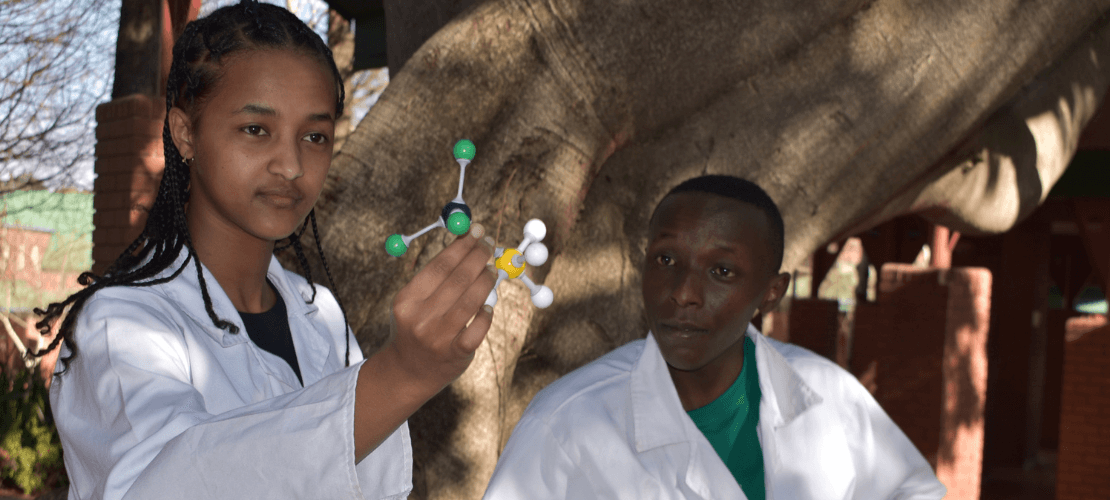 Image of a male scientist examining samples